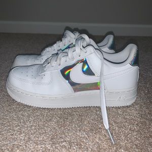 Nike Air Force white 1 low summit white sneaker.